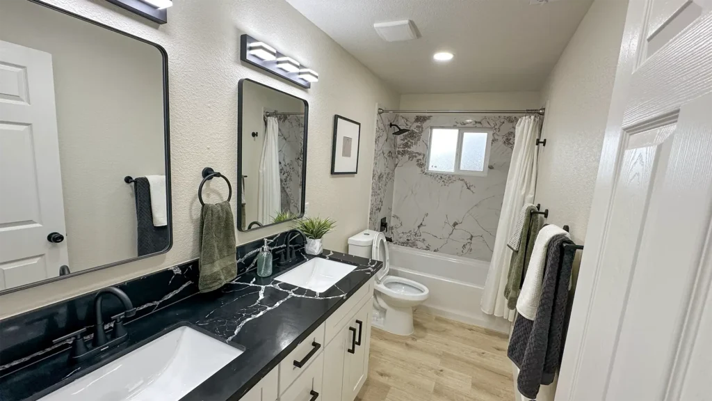 Bathroom remodel featuring detailed final cleaning and code-compliant fixtures ready for homeowner walkthrough in Sacramento, CA by Tenax Construction