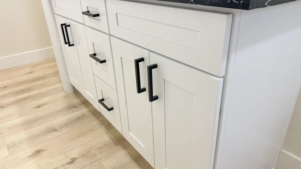 Bathroom remodel featuring water-resistant wall panels and newly installed tile per design specifications in Sacramento, CA by Tenax Construction