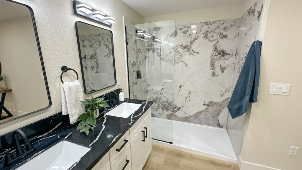 Bathroom remodel featuring careful removal of old wall and floor tile to prepare for new finishes in Sacramento, CA by Tenax Construction
