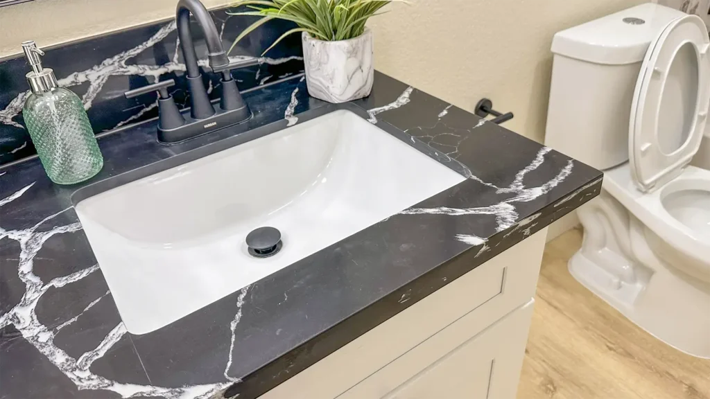 Bathroom remodel featuring edges and joints sealed with high-quality mold-resistant sealants in Sacramento, CA by Tenax Construction