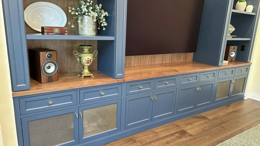 Elegant kitchen remodel featuring painted inset-door perimeter cabinets extending to ceiling with crown molding in Granite Bay, CA by Tenax Construction