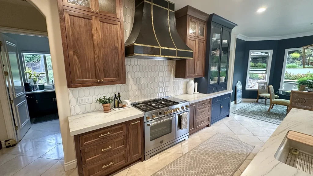 Elegant kitchen remodel featuring removal of old built-ins and soffit for open great room layout in Granite Bay, CA by Tenax Construction