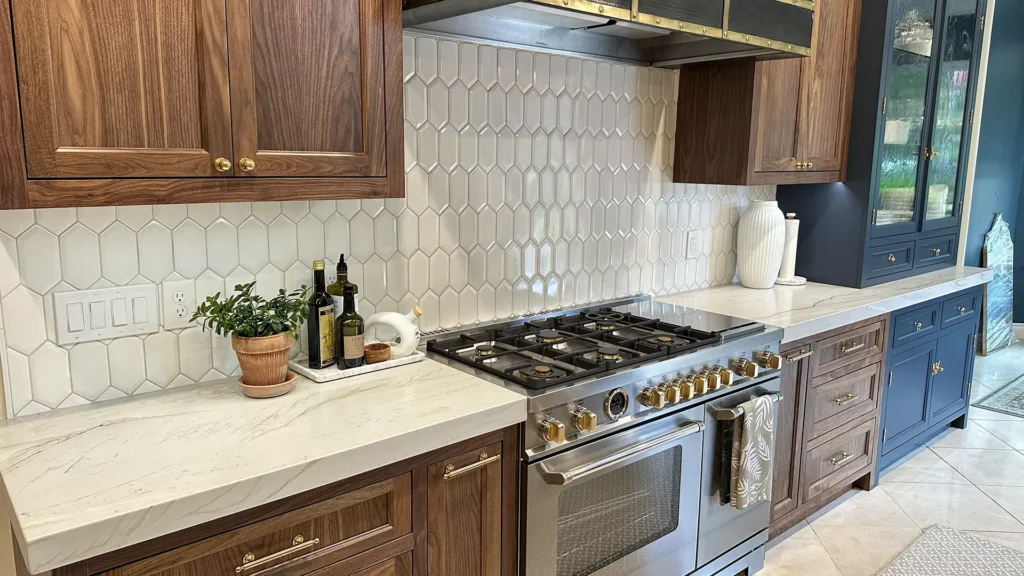 Elegant kitchen remodel featuring walnut faux beam accent across great room ceiling in Granite Bay, CA by Tenax Construction