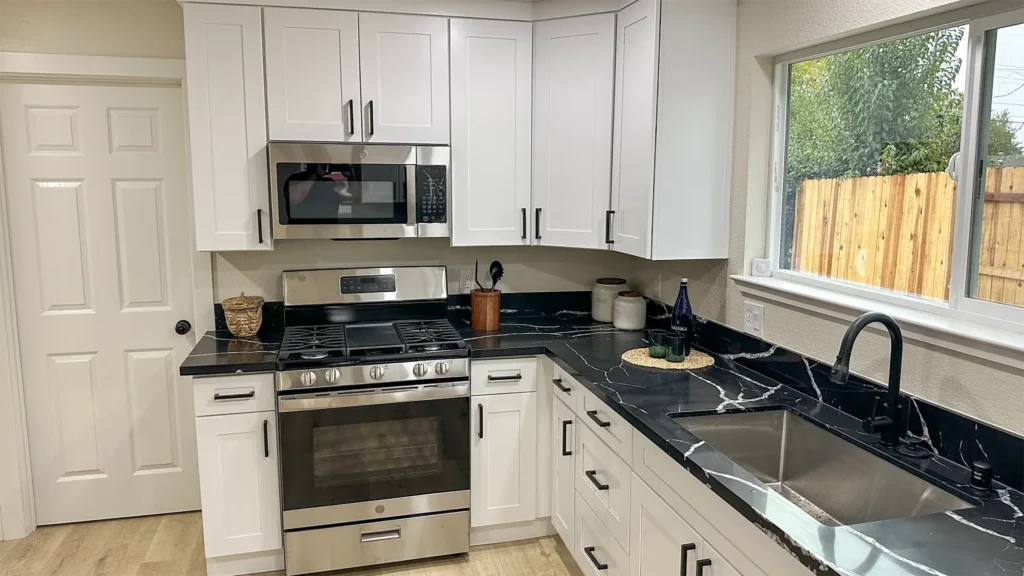 Kitchen remodel featuring new sink and faucet installation for superior performance and style in Sacramento, CA by Tenax Construction