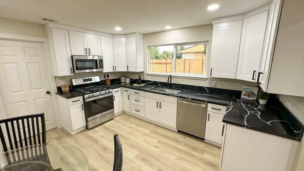 Kitchen remodel featuring safe demolition and disposal of old cabinets countertops and flooring in Sacramento, CA by Tenax Construction
