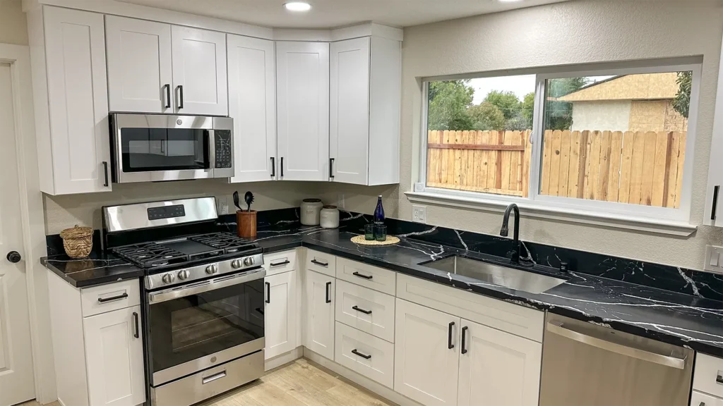 Kitchen remodel featuring walls and ceilings painted with premium finishes for a bright modern look in Sacramento, CA by Tenax Construction