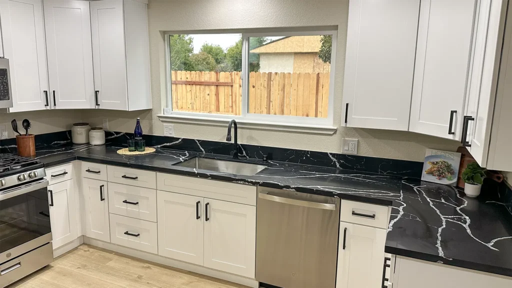 Kitchen remodel featuring complementary tile backsplash elevating the overall kitchen design in Sacramento, CA by Tenax Construction