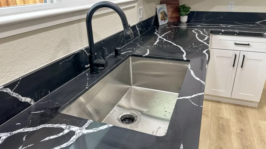 Kitchen remodel featuring new custom cabinetry installed with precise alignment and secure fastening in Sacramento, CA by Tenax Construction