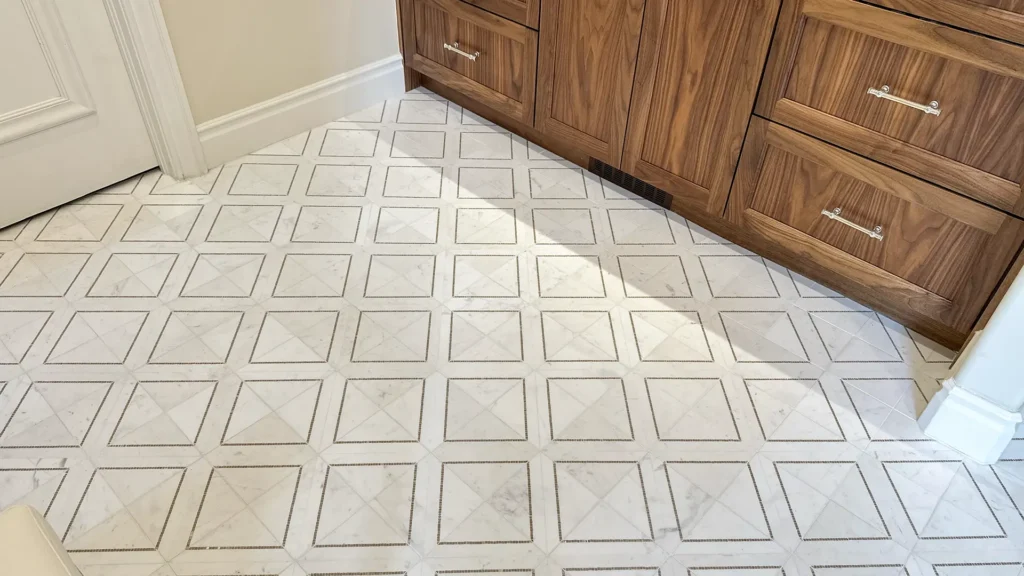 Luxury bathroom remodel featuring new hardwood flooring replacing carpet in adjoining bedroom in Granite Bay, CA by Tenax Construction