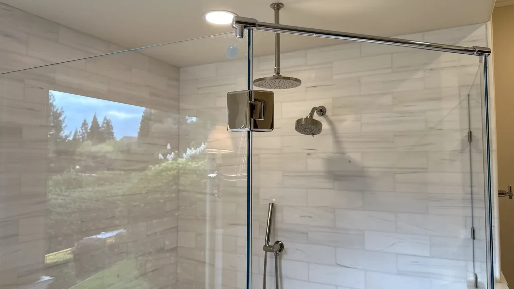 Luxury bathroom remodel featuring double vanity with integrated sinks and marble countertop detail in Granite Bay, CA by Tenax Construction
