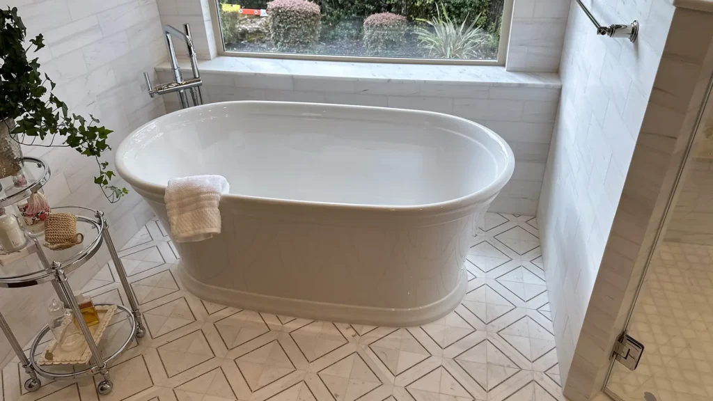 Luxury bathroom remodel featuring preserved toilet reinstallation with fully updated surrounding finishes in Granite Bay, CA by Tenax Construction