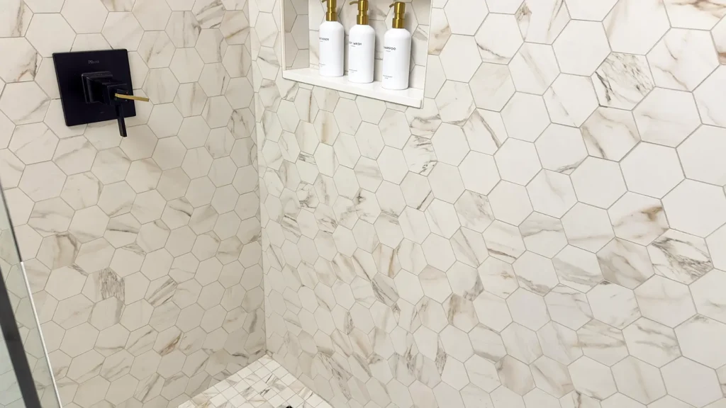 Luxury primary bathroom remodel featuring new pocket doors and expanded walk-in closet integration in Gold River, CA by Tenax Construction