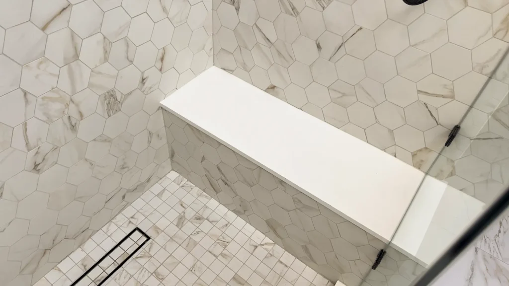 Luxury primary bathroom remodel featuring 9-foot ceiling achieved through structural framing modifications in Gold River, CA by Tenax Construction