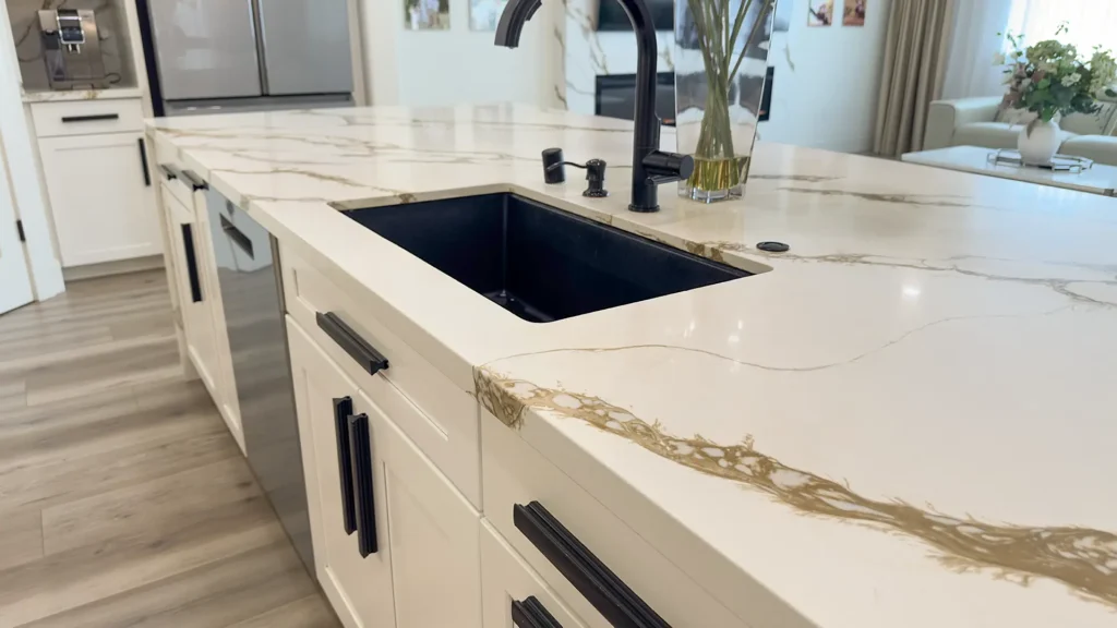 Modern luxury kitchen remodel featuring sleek black sink faucet and updated plumbing fixtures in Roseville, CA by Tenax Construction