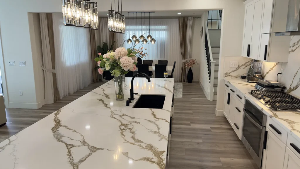 Modern luxury kitchen remodel featuring full-height backsplash extending seamlessly behind the range in Roseville, CA by Tenax Construction