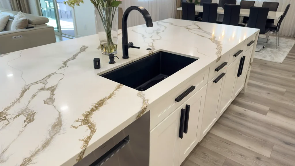 Modern luxury kitchen remodel featuring open-concept layout flowing into dining and living areas in Roseville, CA by Tenax Construction