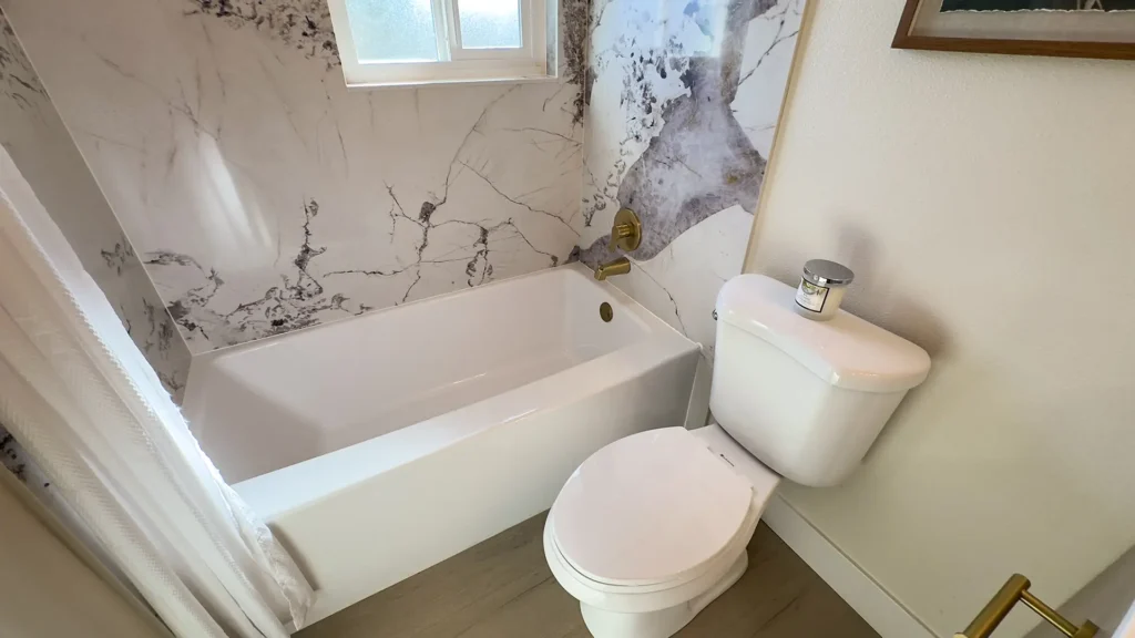 Bathroom remodel featuring clean concrete slab demo and repour for secure plumbing changes in Fair Oaks, CA by Tenax Construction