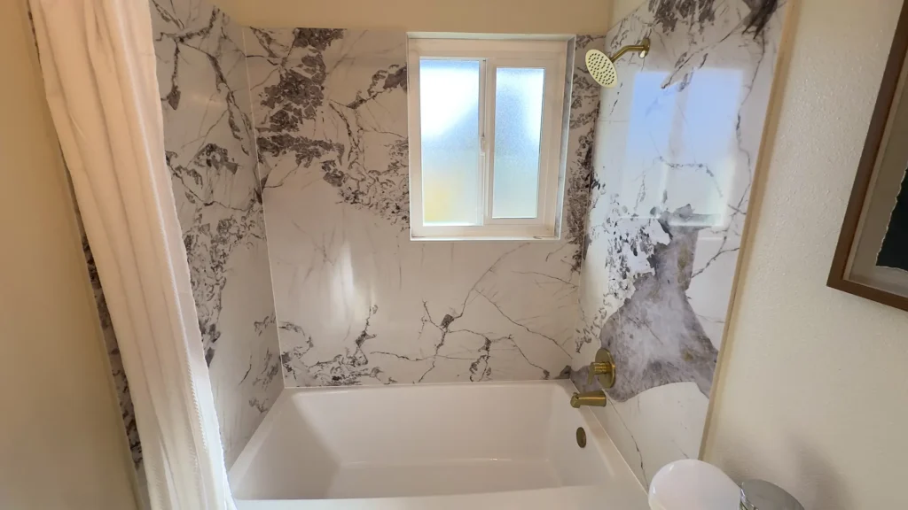 Bathroom remodel featuring precision fixture installation including shower trim kits valves and faucets in Fair Oaks, CA by Tenax Construction