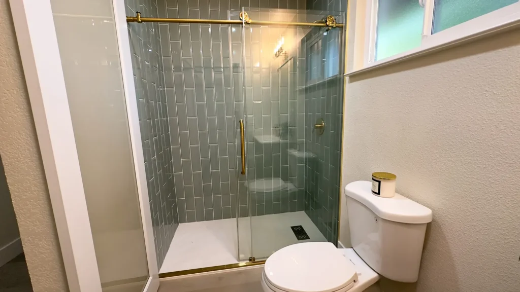 Bathroom remodel featuring second-floor hallway bathroom update with durable easy-care materials in Fair Oaks, CA by Tenax Construction