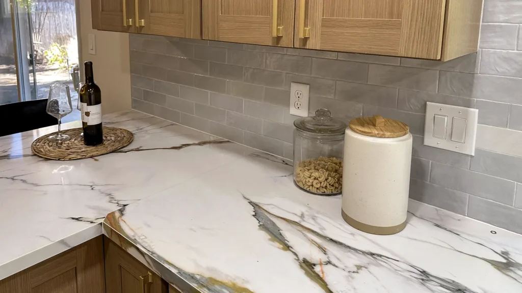 Kitchen remodel featuring precise plumbing re-routes for sink dishwasher and refrigerator lines in Fair Oaks, CA by Tenax Construction