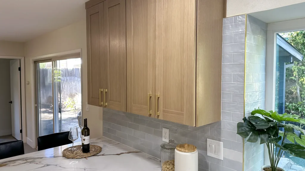 Kitchen remodel featuring full-height tile backsplash installed up to the ceiling for a modern finish in Fair Oaks, CA by Tenax Construction