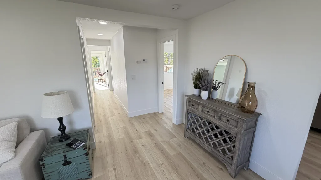 Complete home remodel featuring new recessed can lights and fan and light installations throughout living areas in Lincoln, CA by Tenax Construction