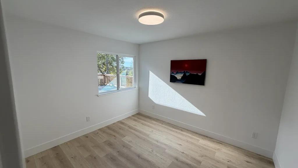 Complete home remodel featuring second full bathroom remodel with tile flooring and updated plumbing fixtures in Lincoln, CA by Tenax Construction