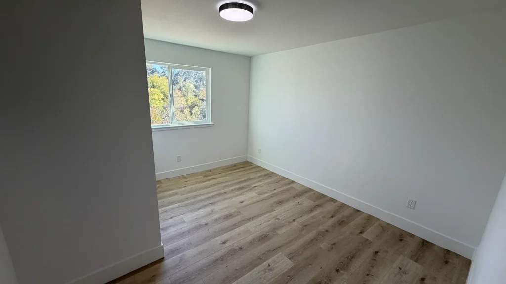 Complete home remodel featuring full bathroom remodel with tile floors waterproofing and quartz shower walls in Lincoln, CA by Tenax Construction