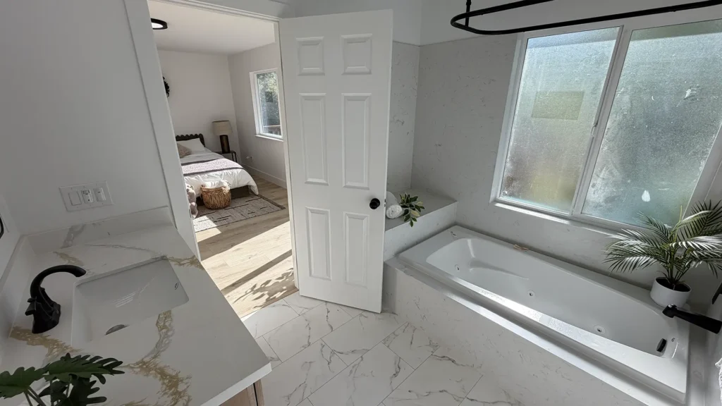 Complete home remodel featuring new hardwood flooring installation across main living areas with subfloor prep in Lincoln, CA by Tenax Construction
