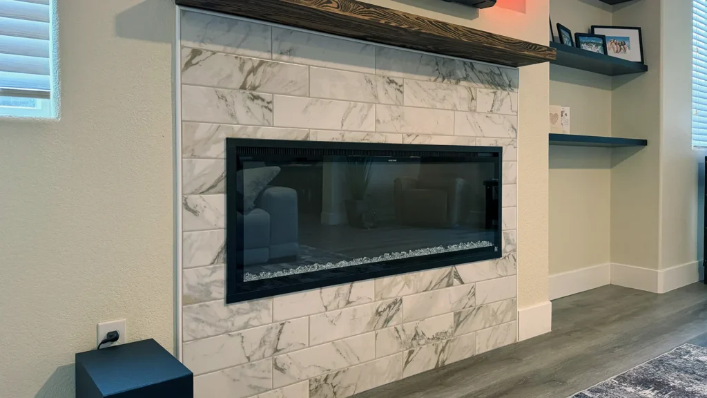 Full kitchen remodel and fireplace conversion featuring patched drywall and 2x8 wood blocking for secure TV bracket mounting in Elk Grove, CA by Tenax Construction