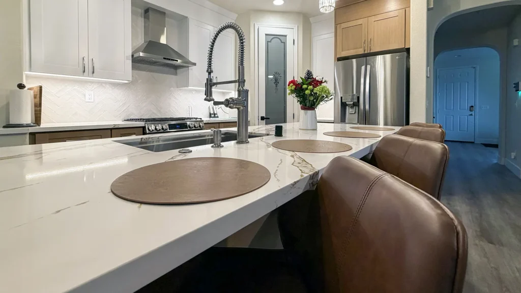 Full kitchen remodel featuring smart switches and outlets with trash pull-out cabinet on island in Elk Grove, CA by Tenax Construction