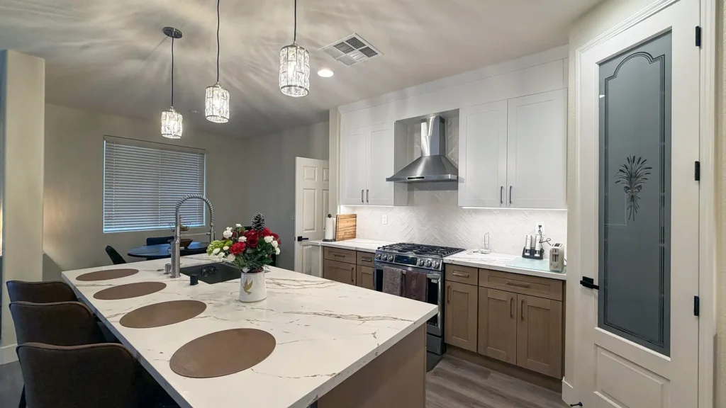 Full kitchen remodel featuring under-cabinet LED lighting and under-cabinet power strips for clean backsplash look in Elk Grove, CA by Tenax Construction