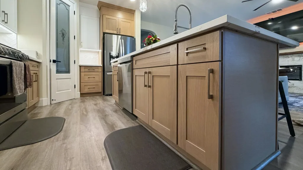 Full kitchen remodel featuring reconfigured island with 96-inch pony wall and 12-inch overhang for bar seating in Elk Grove, CA by Tenax Construction