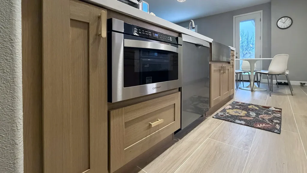 Modern kitchen remodel featuring full replacement of kitchen can lights with new 6-inch white LED recessed lights in Antelope, CA by Tenax Construction