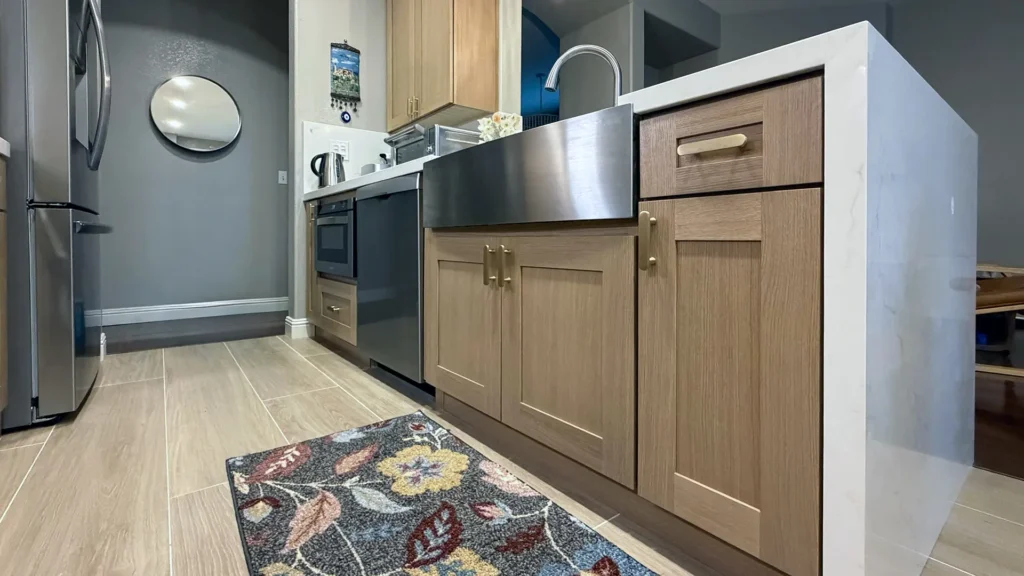 Modern kitchen remodel featuring new p-trap assembly and updated hot and cold valves for kitchen sink in Antelope, CA by Tenax Construction