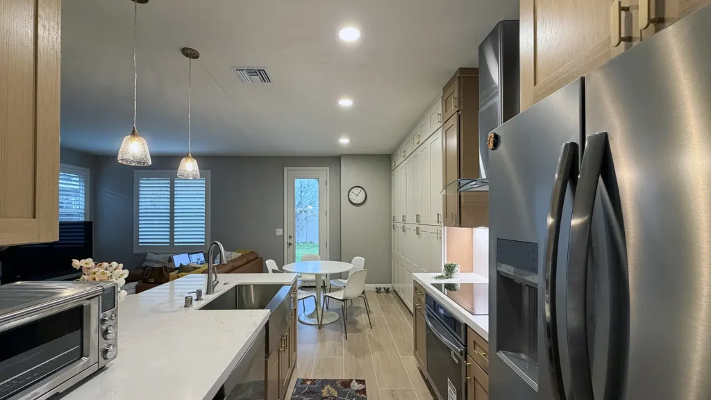 Modern kitchen remodel featuring tile backsplash in custom pattern with Schluter trims and professional layout in Antelope, CA by Tenax Construction