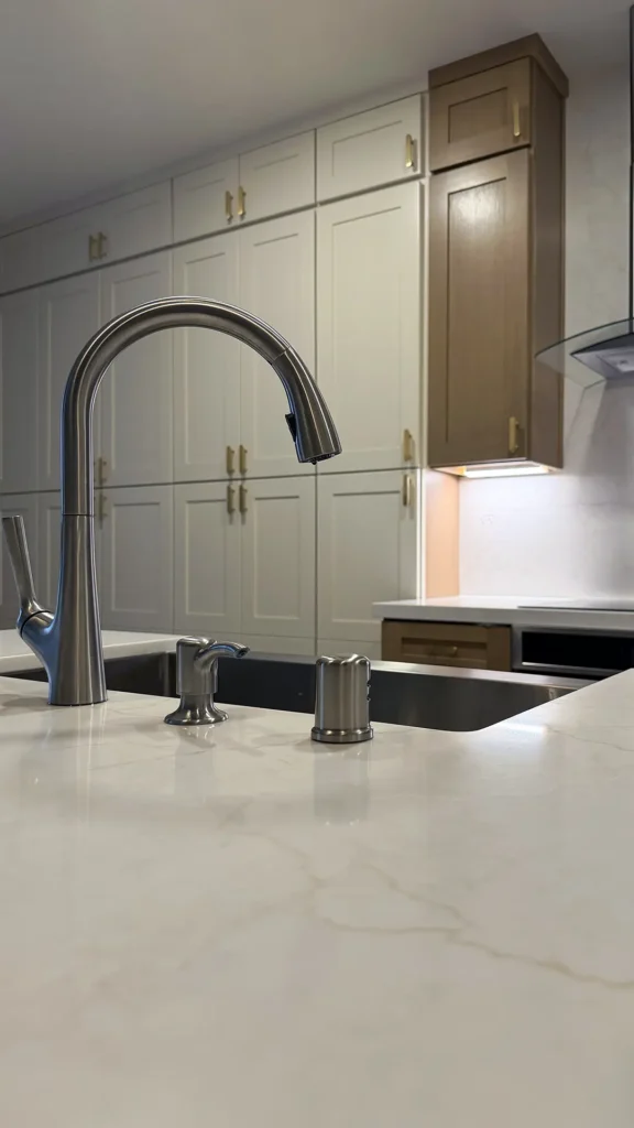 Modern kitchen remodel featuring installed homeowner-provided appliances connected to existing utilities in Antelope, CA by Tenax Construction