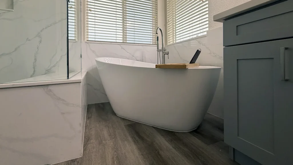 Spa-like master bathroom remodel featuring 18x84 inch pantry cabinet for tall enclosed linen and toiletry storage in Elk Grove, CA by Tenax Construction