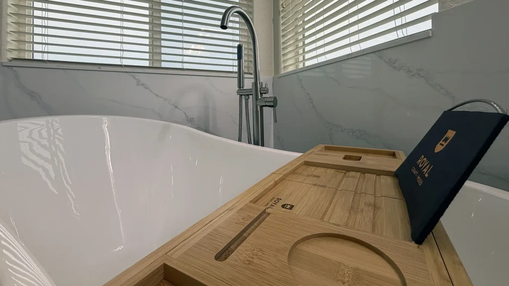 Spa-like master bathroom remodel featuring 76-inch double sink vanity with quartz countertops and new sinks in Elk Grove, CA by Tenax Construction