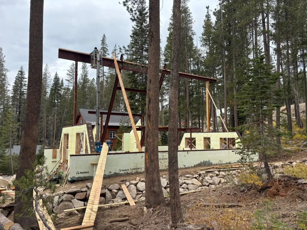 ICF mountain home construction featuring 200A electrical service and modern wiring for smart controls in Soda Springs, CA by Tenax Construction