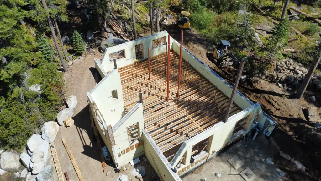ICF mountain home construction featuring high-elevation HVAC system for extreme winter heating efficiency in Soda Springs, CA by Tenax Construction