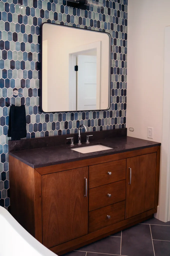 Full bathroom remodel featuring spa-like master bathroom with layered lighting and modern fixtures in Sacramento, CA by Tenax Construction