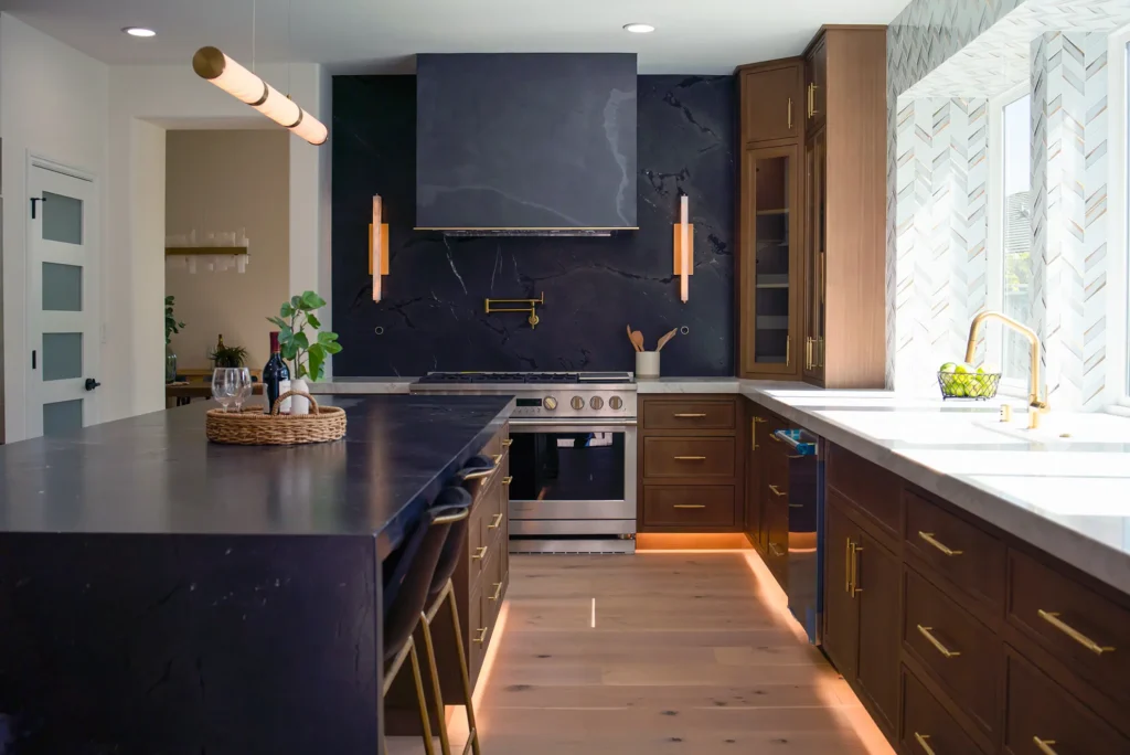 Full kitchen remodel featuring new faucet garbage disposal and re-routed plumbing above range in Sacramento, CA by Tenax Construction