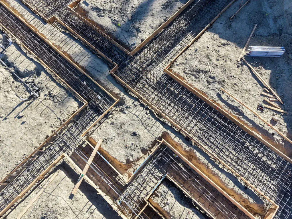 Luxury ICF custom home construction featuring 12000-gallon water storage tank and plumbing rough-in in Indio, CA by Tenax Construction