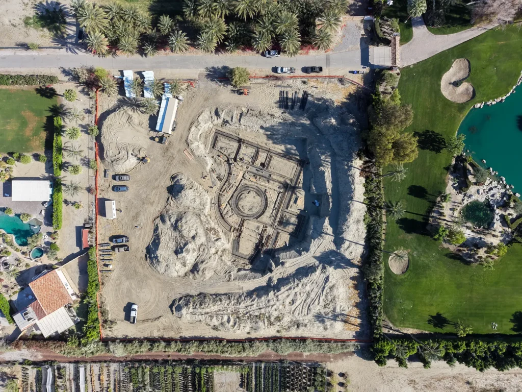 Luxury ICF custom home construction featuring architectural concrete staircase with radius treads and risers in Indio, CA by Tenax Construction