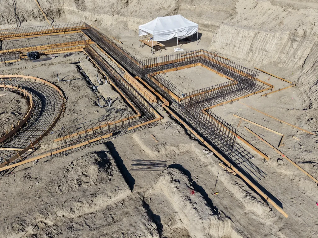 Luxury ICF custom home construction featuring overall project site progress view in Indio, CA by Tenax Construction