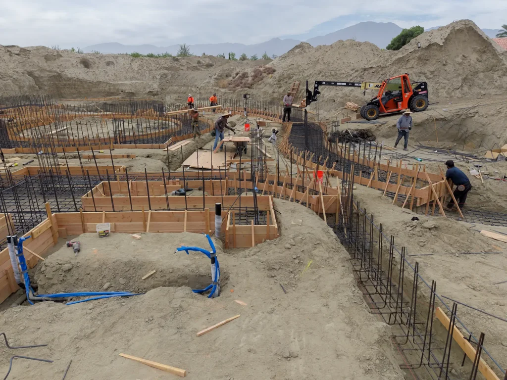 Luxury ICF custom home construction featuring radius perimeter forming for elevated concrete slab in Indio, CA by Tenax Construction