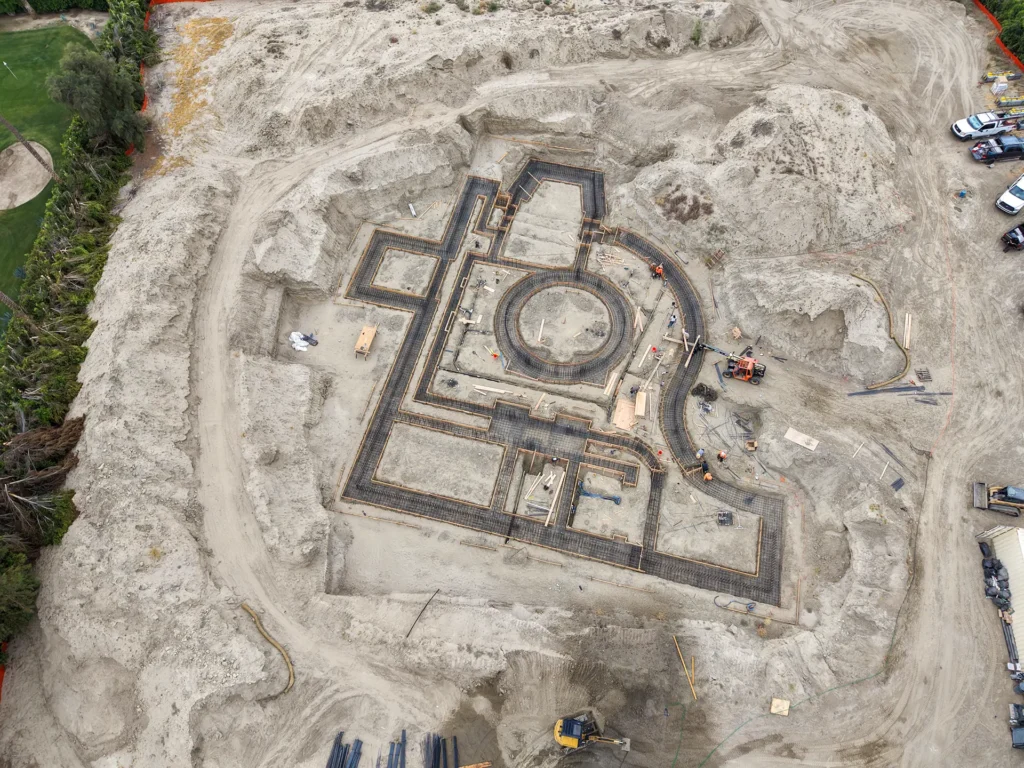 Luxury ICF custom home construction featuring below-grade drainage board and perforated drain pipe system in Indio, CA by Tenax Construction