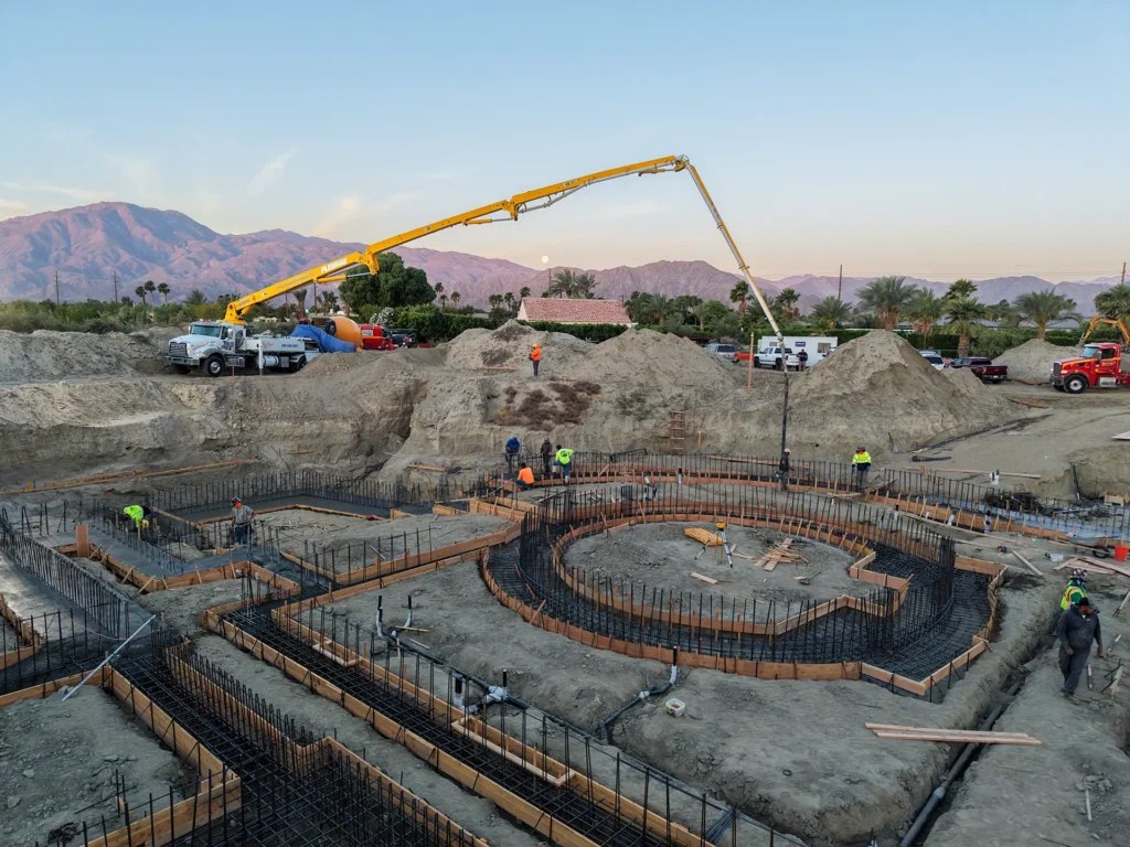 Luxury ICF custom home construction featuring MEP penetrations integrated into ICF walls before pour in Indio, CA by Tenax Construction