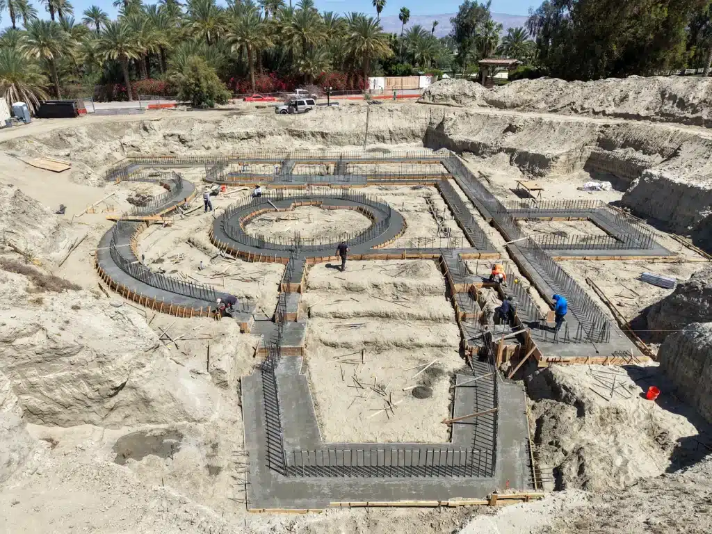 Luxury ICF custom home construction featuring precisely graded building pad and desert excavation in Indio, CA by Tenax Construction